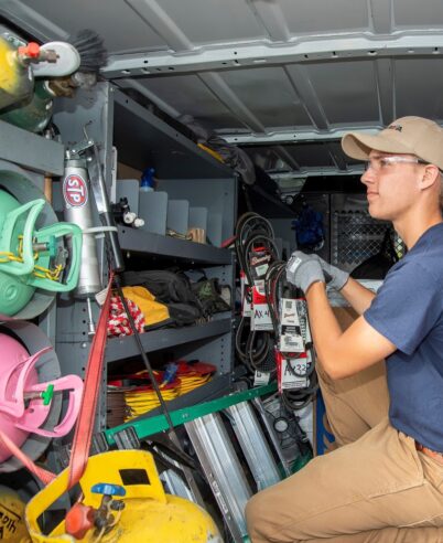 Young man in back of truck cropped